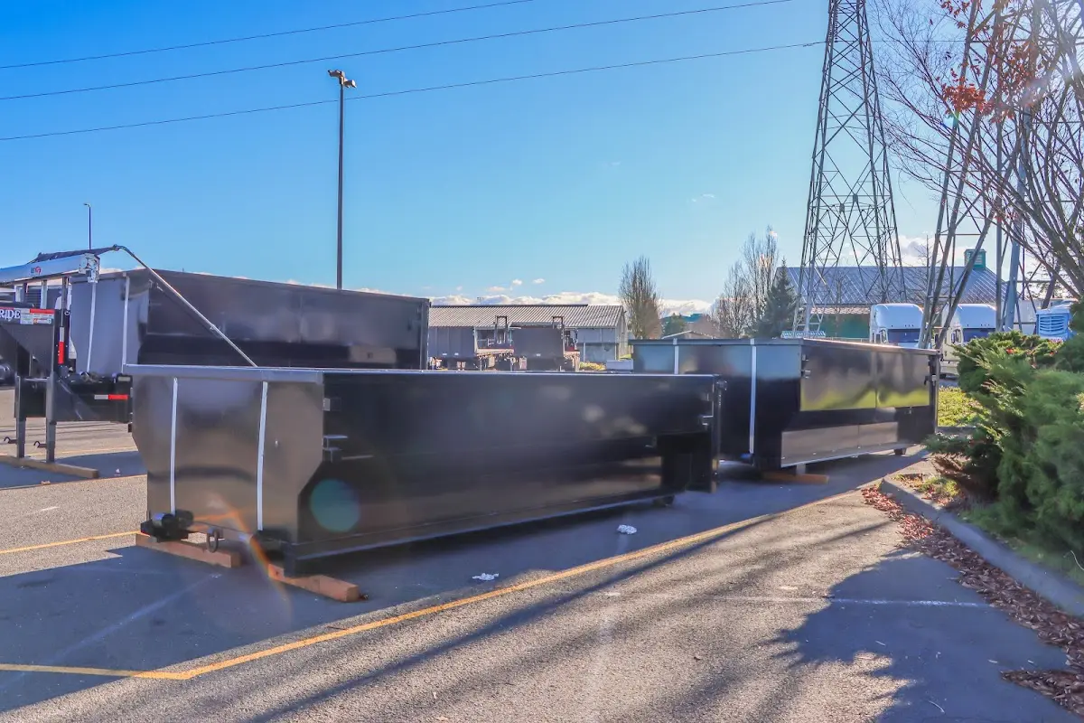 Roll-off dumpster ready for waste disposal at job site for Commercial Dumpster Rental in Bloomer
